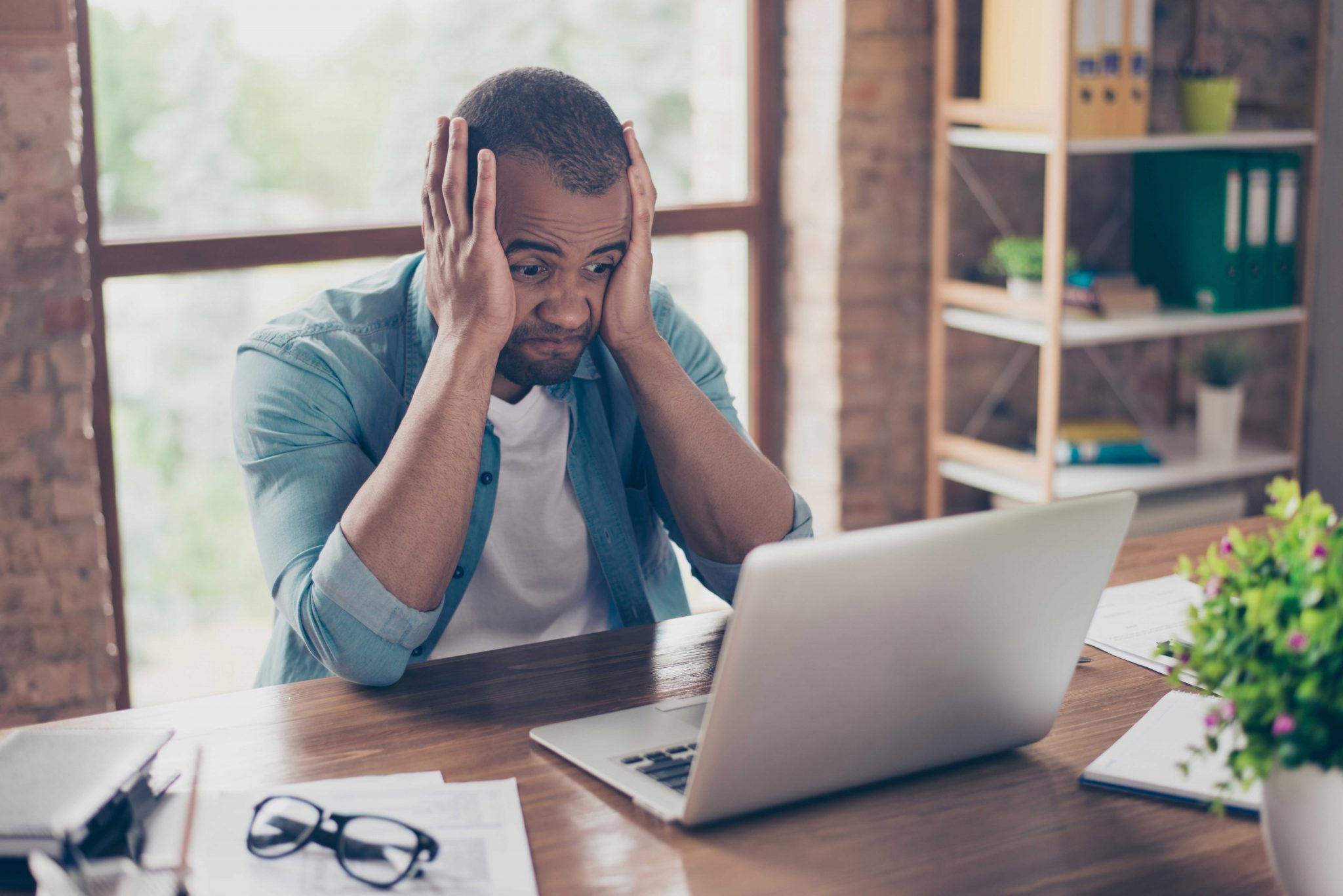 Man that is stressed out because he needs a WordPress Support Plan