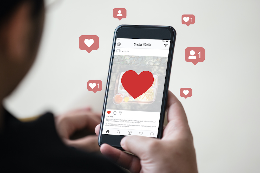 A person shares a like on Instagram.
