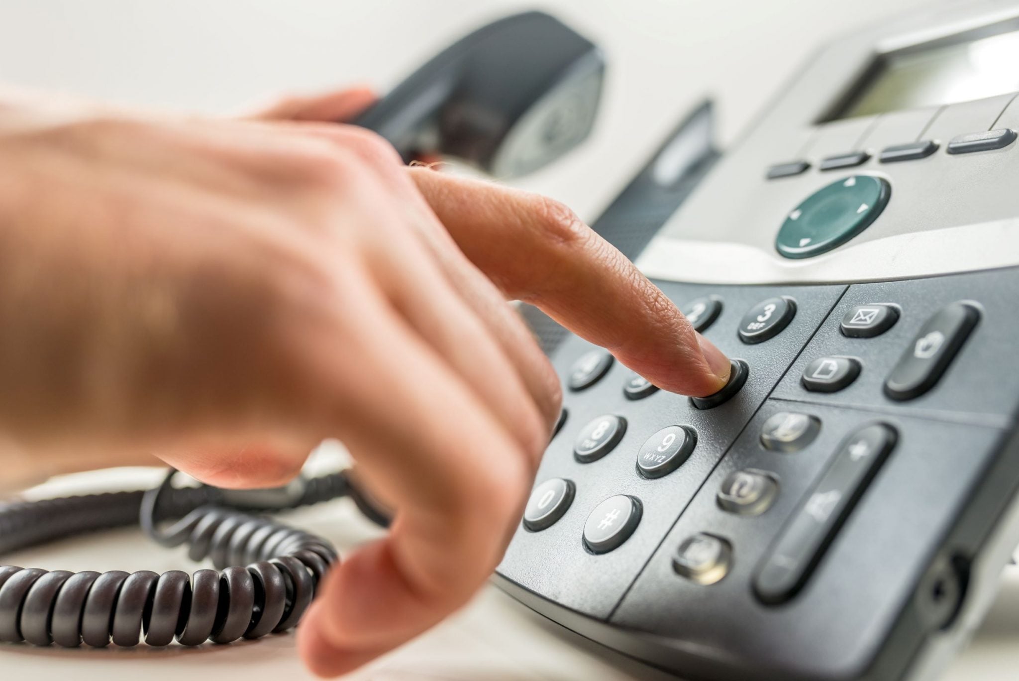 Hand dialing on a landline phone