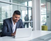 African american businessman working on a laptop.