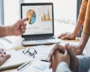 Business team collaboration discussing working analyzing with financial data and marketing growth report graph in team, presentation and brainstorming to strategy planning making profit of company.