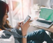 Asian woman hold mobile phone text or message.