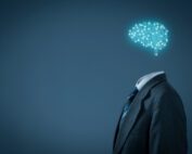 Body wearing a suit with floating blue design of brain, signifiying AI.