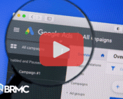 A magnified view of a Google Ads campaign interface is overlaid with a video play button, highlighting digital ad tutorials.