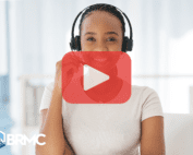 A cheerful support agent wearing a headset is featured with a play button overlay, suggesting a training or promo video.