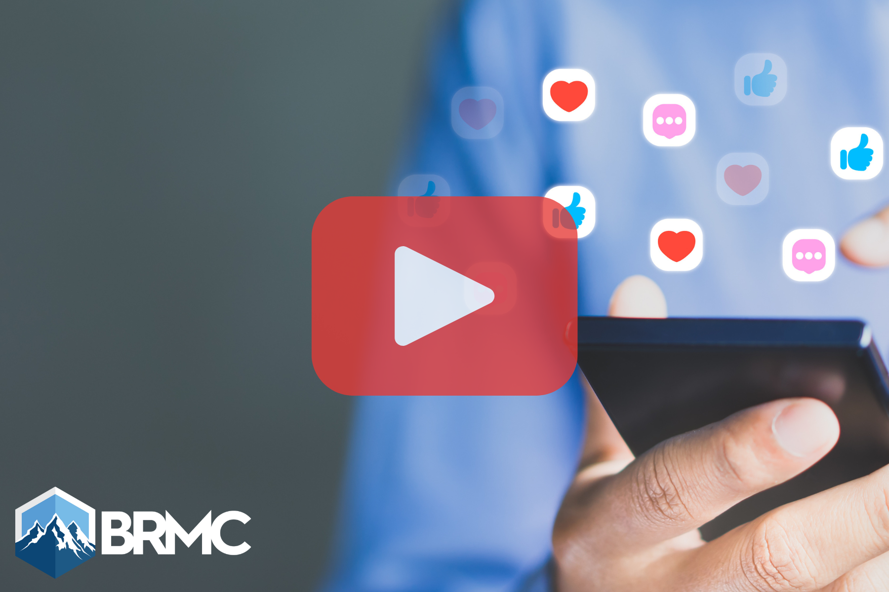 A person holding a smartphone with floating social media icons (likes, hearts, comments) and a large play button overlay, symbolizing video content and online engagement.