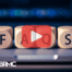 Wooden cubes spelling FAQS. Red play button overlay and BRMC logo}.