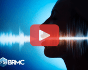 Outline of human face and voice. Red play buttom overlay and BRMC logo