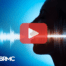 Outline of human face and voice. Red play buttom overlay and BRMC logo